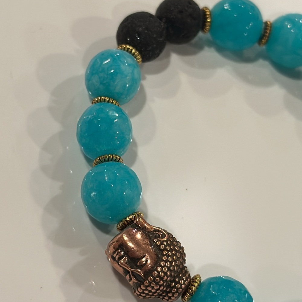 Handmade artisan stretchy bracelet with authentic gemstones and gold Buddha bead